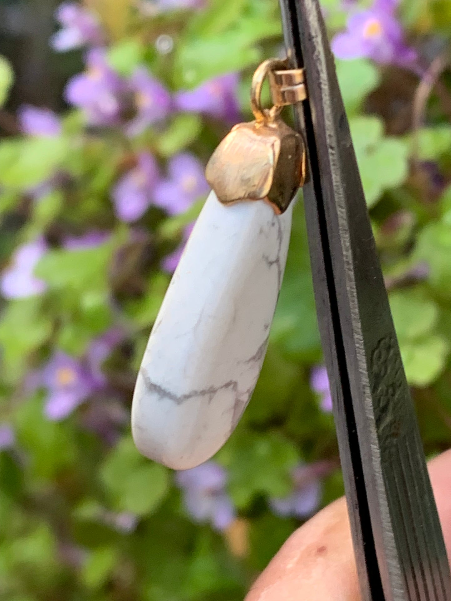 Howlite, pendant 34mm high x 13 wide x 5 thick. Sold with adjustable black cord!