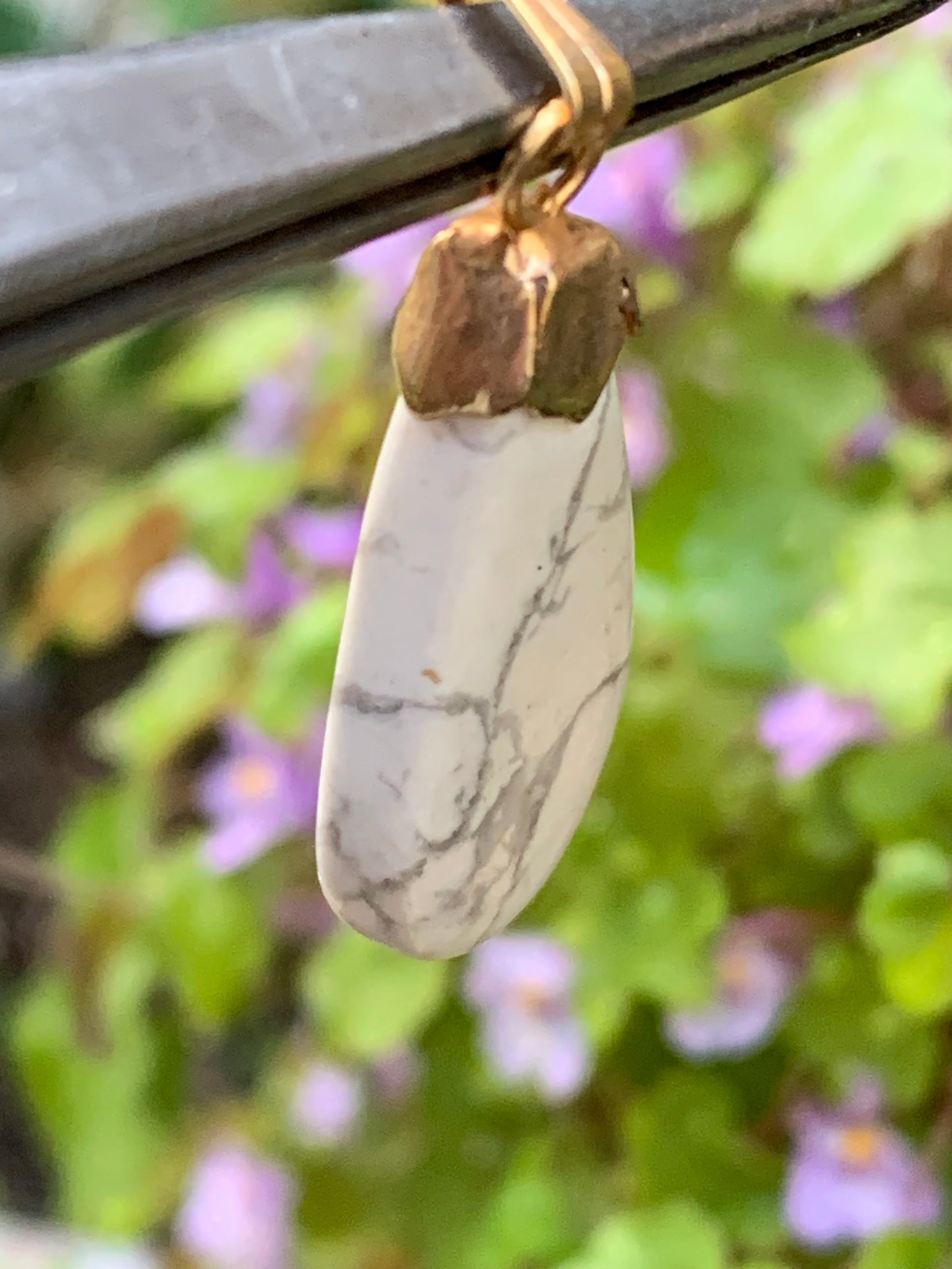 Howlite, pendant 34mm high x 13 wide x 5 thick. Sold with adjustable black cord!