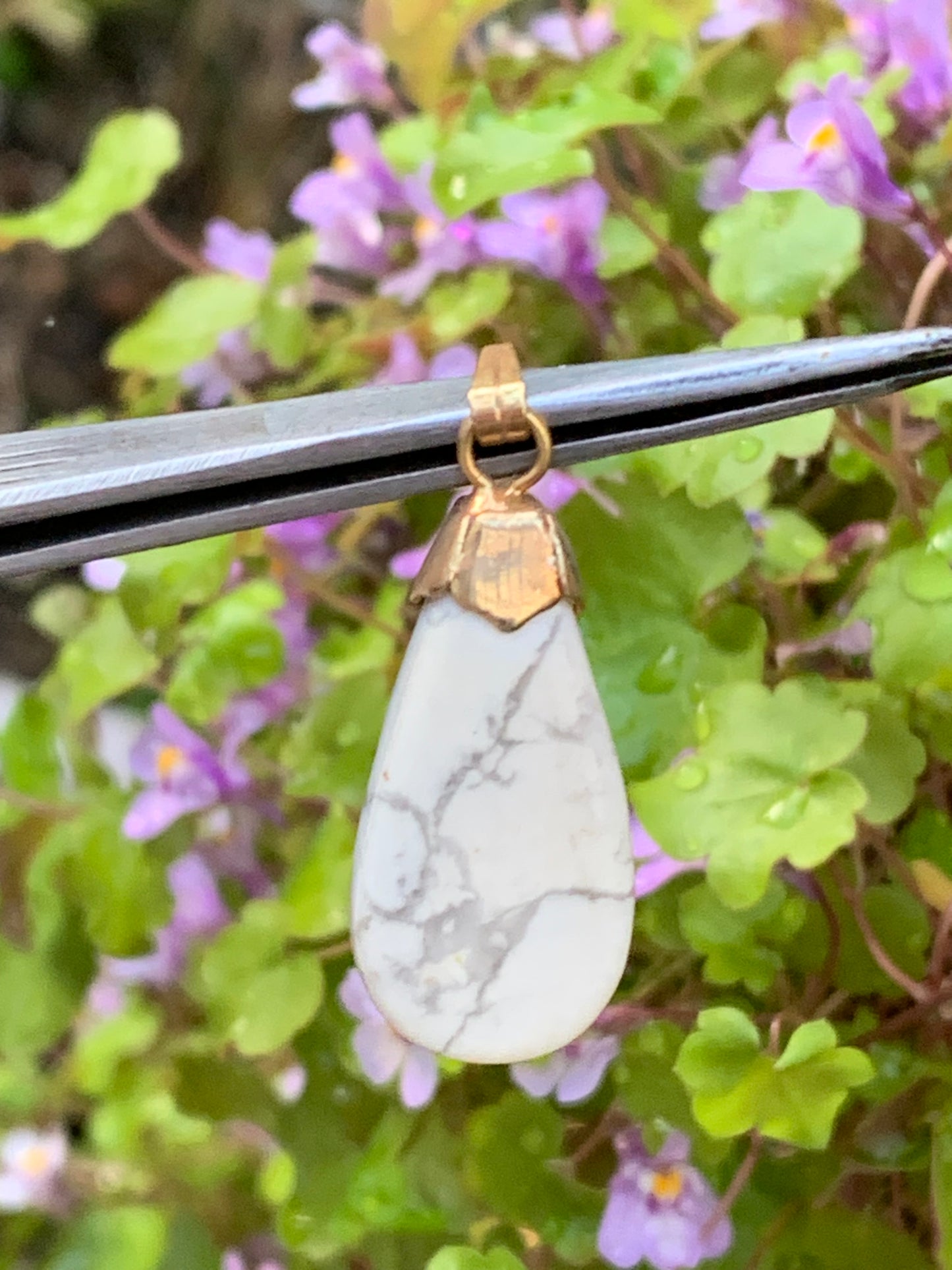 Howlite, pendant 34mm high x 13 wide x 5 thick. Sold with adjustable black cord!