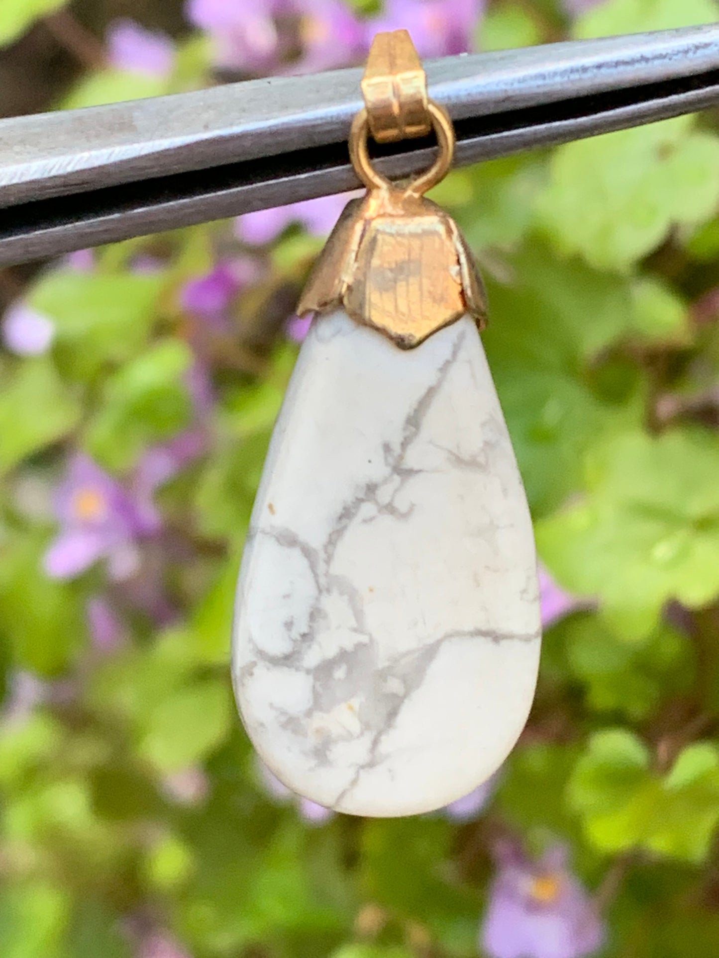 Howlite, pendant 34mm high x 13 wide x 5 thick. Sold with adjustable black cord!