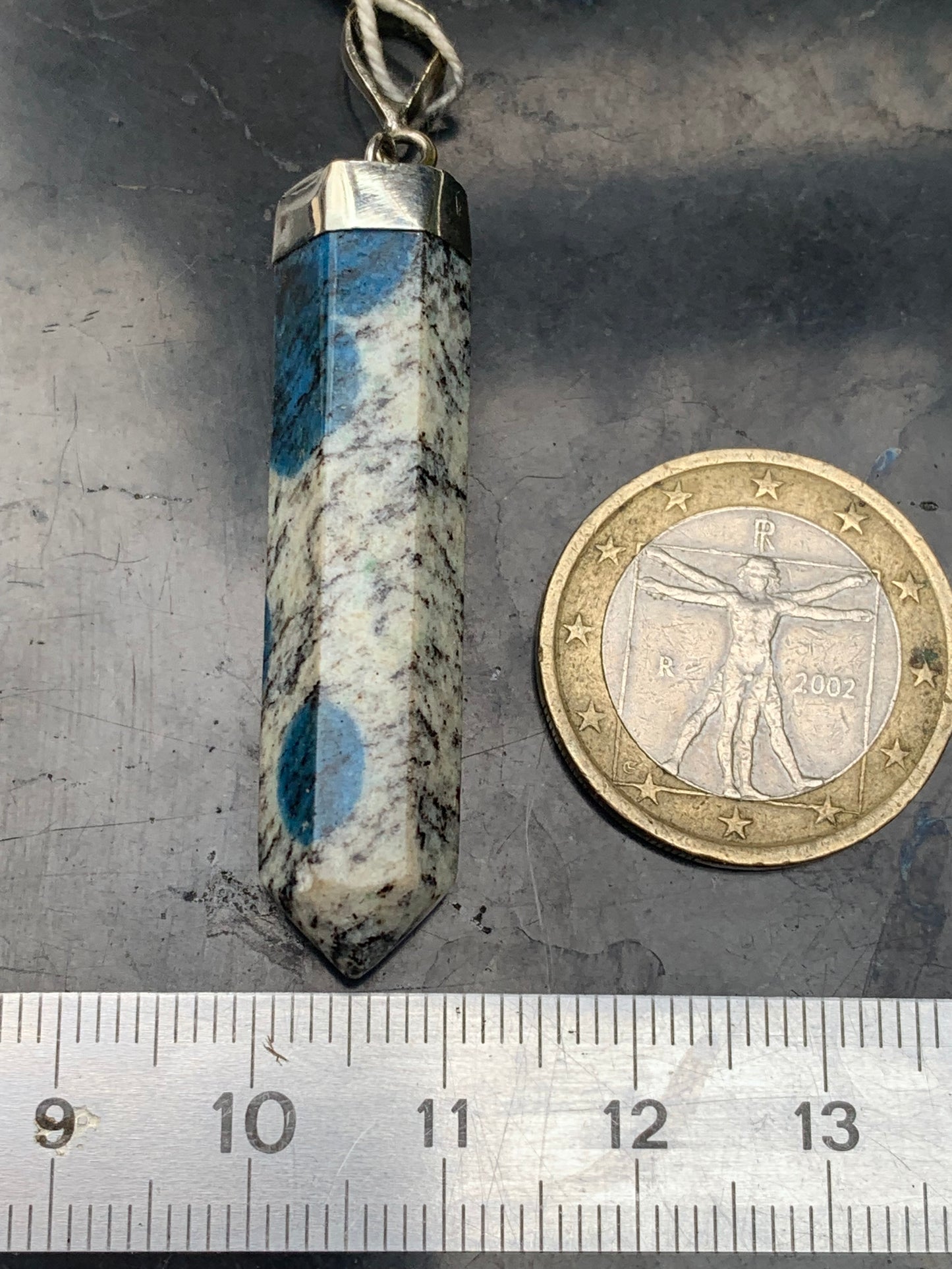 Jasper K2* (Granite with Azurite), piece in rhodium-plated 0925 Silver, 50 millimeters high x 10 millimeters wide x 10 thick. Sold with an adjustable black cord!
