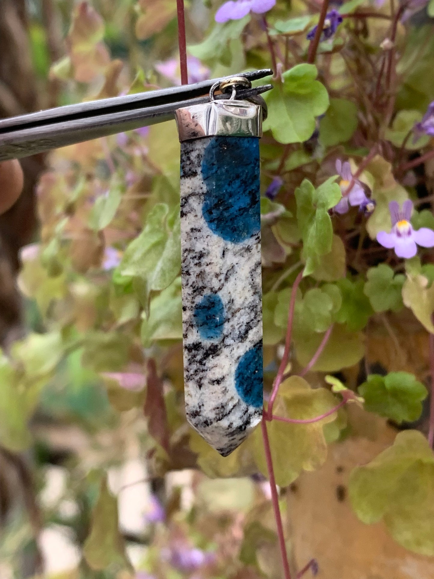 Jasper K2* (Granite with Azurite), piece in rhodium-plated 0925 Silver, 50 millimeters high x 10 millimeters wide x 10 thick. Sold with an adjustable black cord!