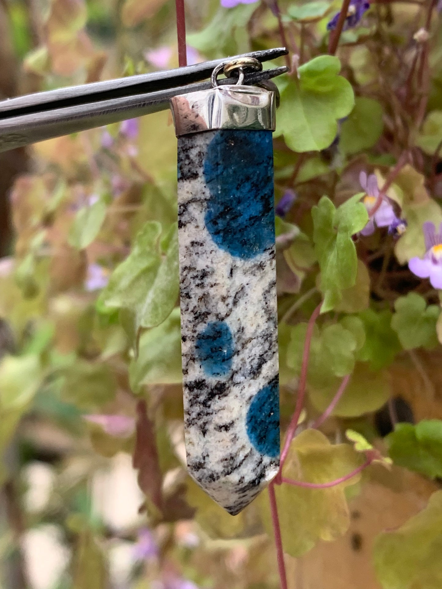 Jasper K2* (Granite with Azurite), piece in rhodium-plated 0925 Silver, 50 millimeters high x 10 millimeters wide x 10 thick. Sold with an adjustable black cord!
