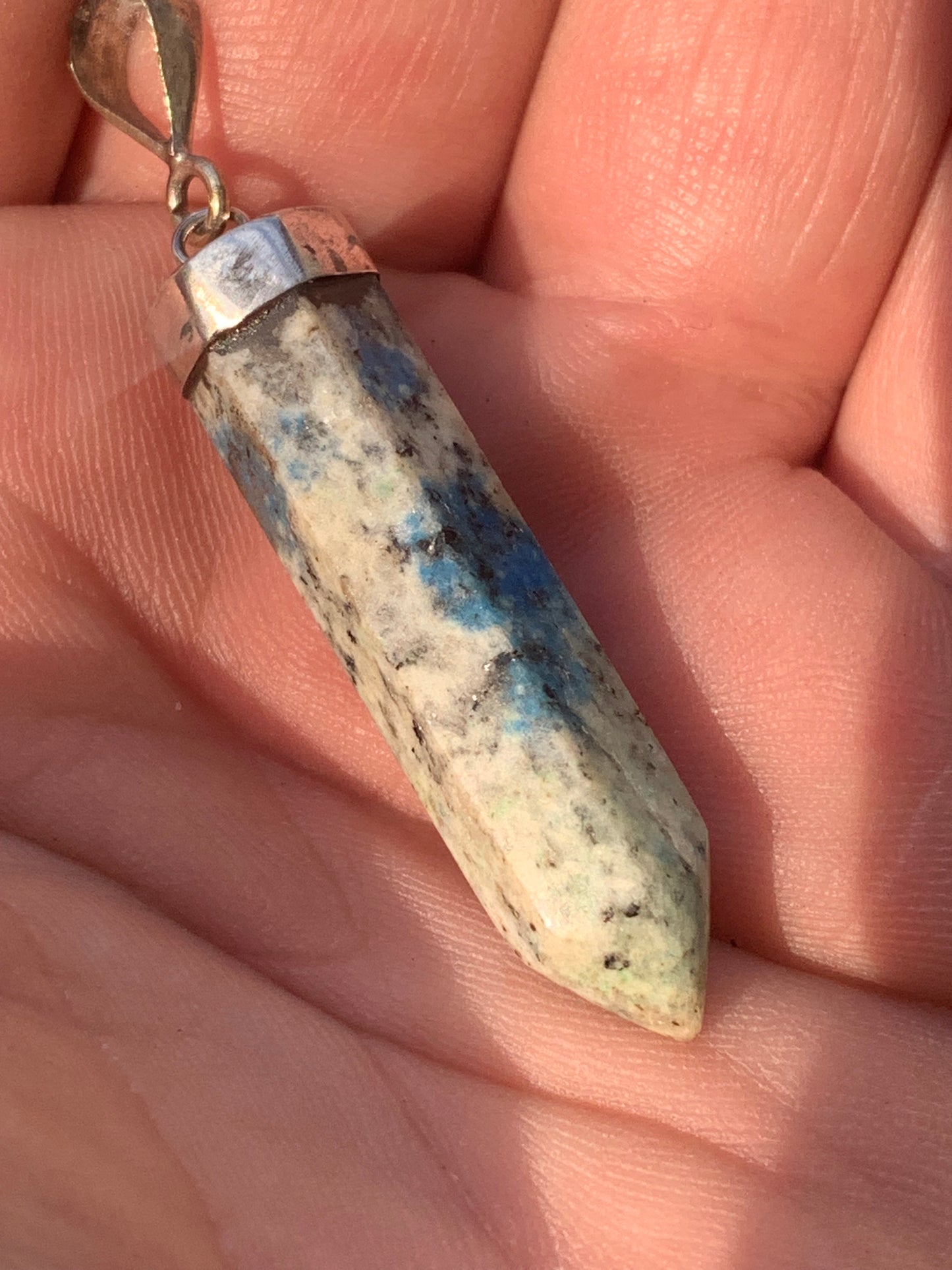 Jasper K2* (Granite with Azurite), piece in rhodium-plated 0925 Silver, 50 millimeters high x 9 millimeters wide x 9 thick. Sold with an adjustable black cord!