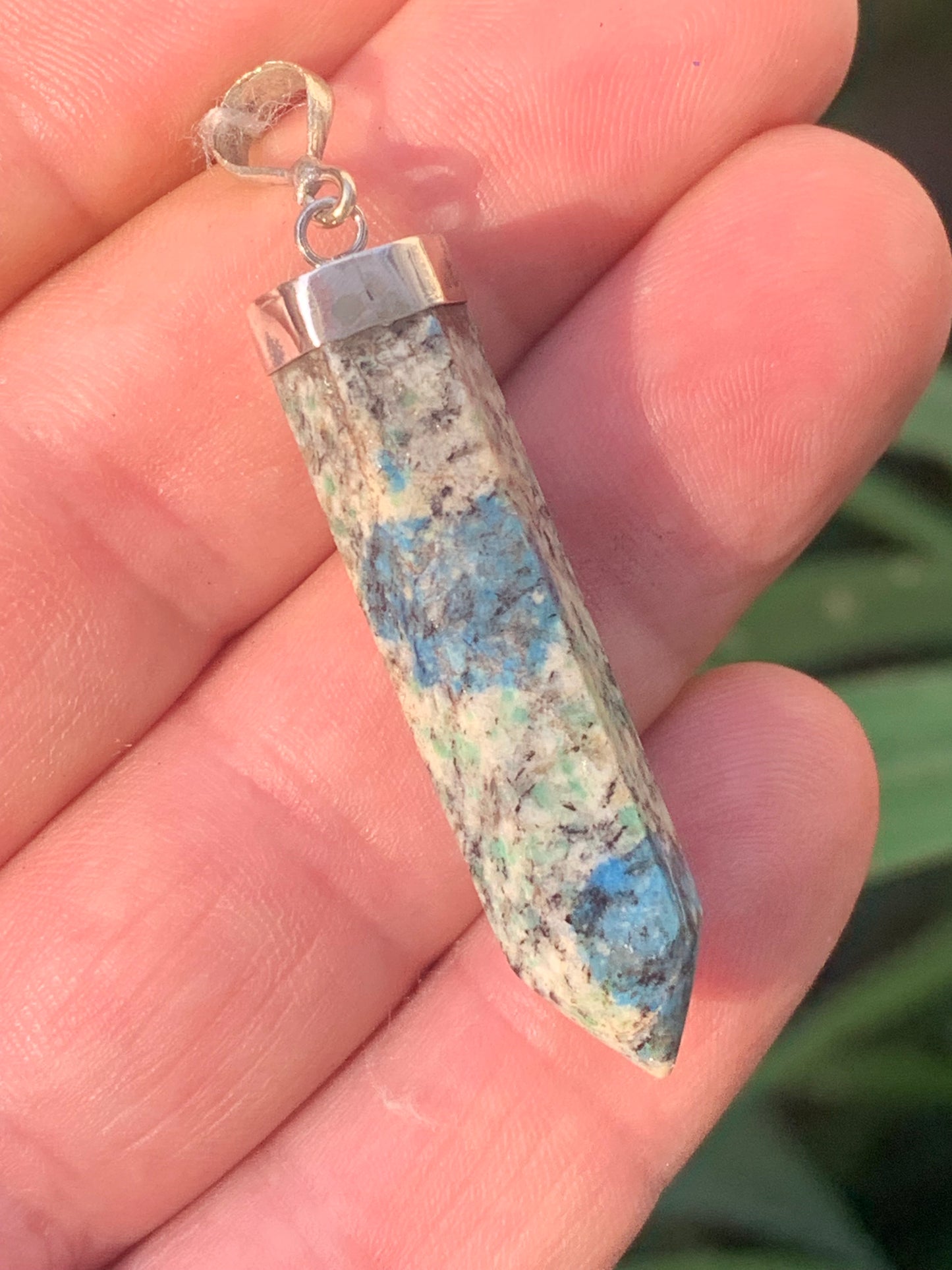Jasper K2* (Granite with Azurite), piece in rhodium-plated 0925 Silver, 58 millimeters high x 10 millimeters wide x 10 thick. Sold with an adjustable black cord!