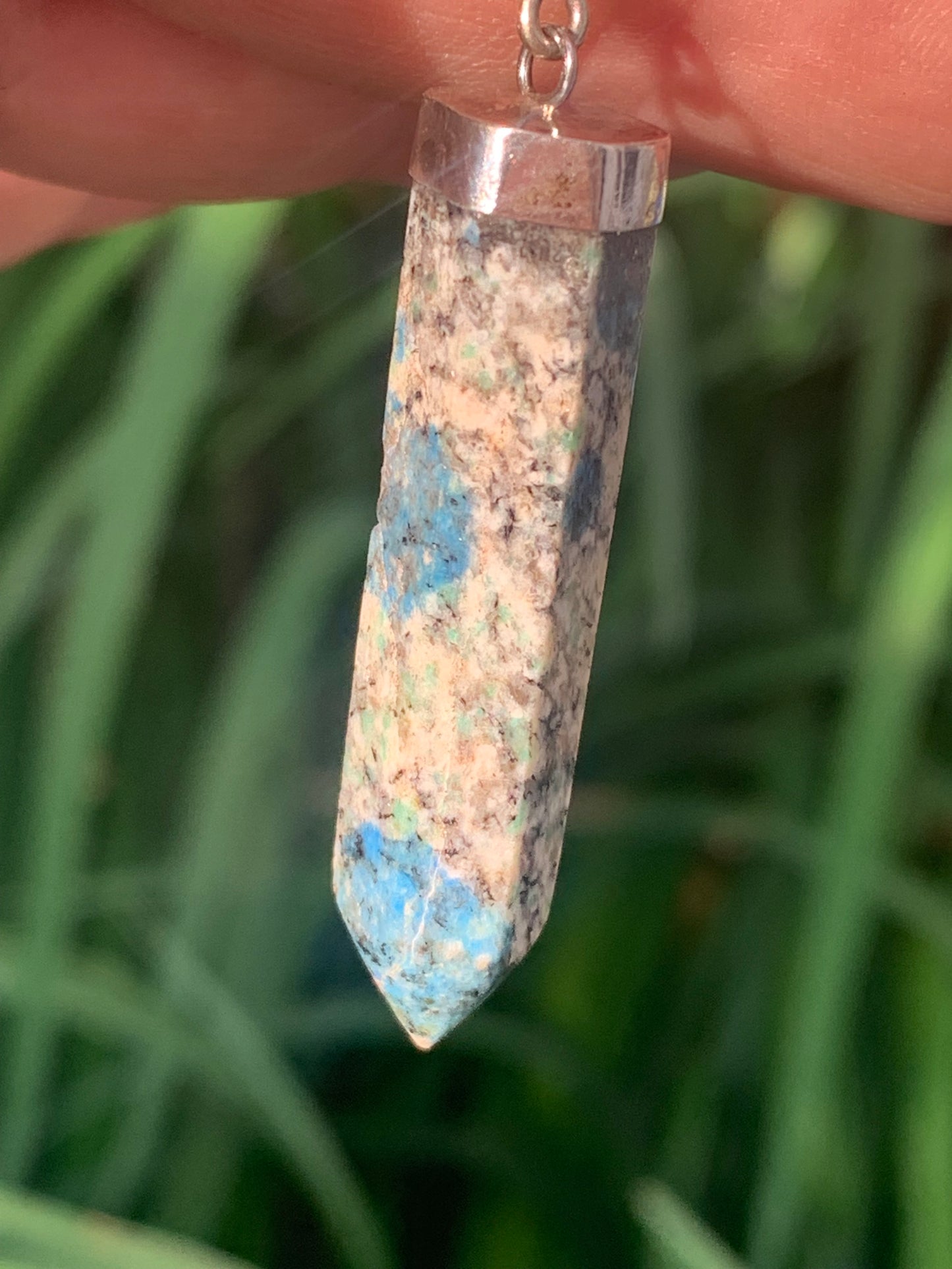 Jasper K2* (Granite with Azurite), piece in rhodium-plated 0925 Silver, 58 millimeters high x 10 millimeters wide x 10 thick. Sold with an adjustable black cord!