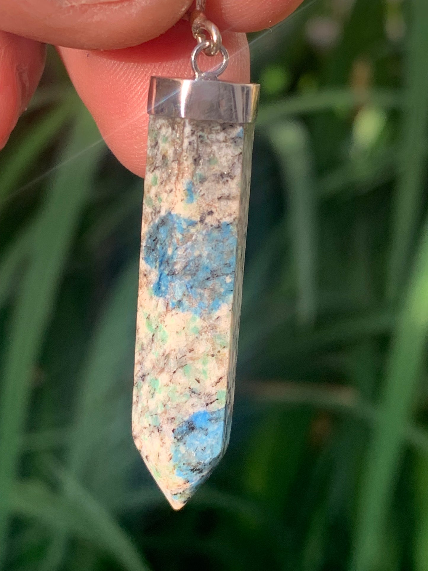 Jasper K2* (Granite with Azurite), piece in rhodium-plated 0925 Silver, 58 millimeters high x 10 millimeters wide x 10 thick. Sold with an adjustable black cord!