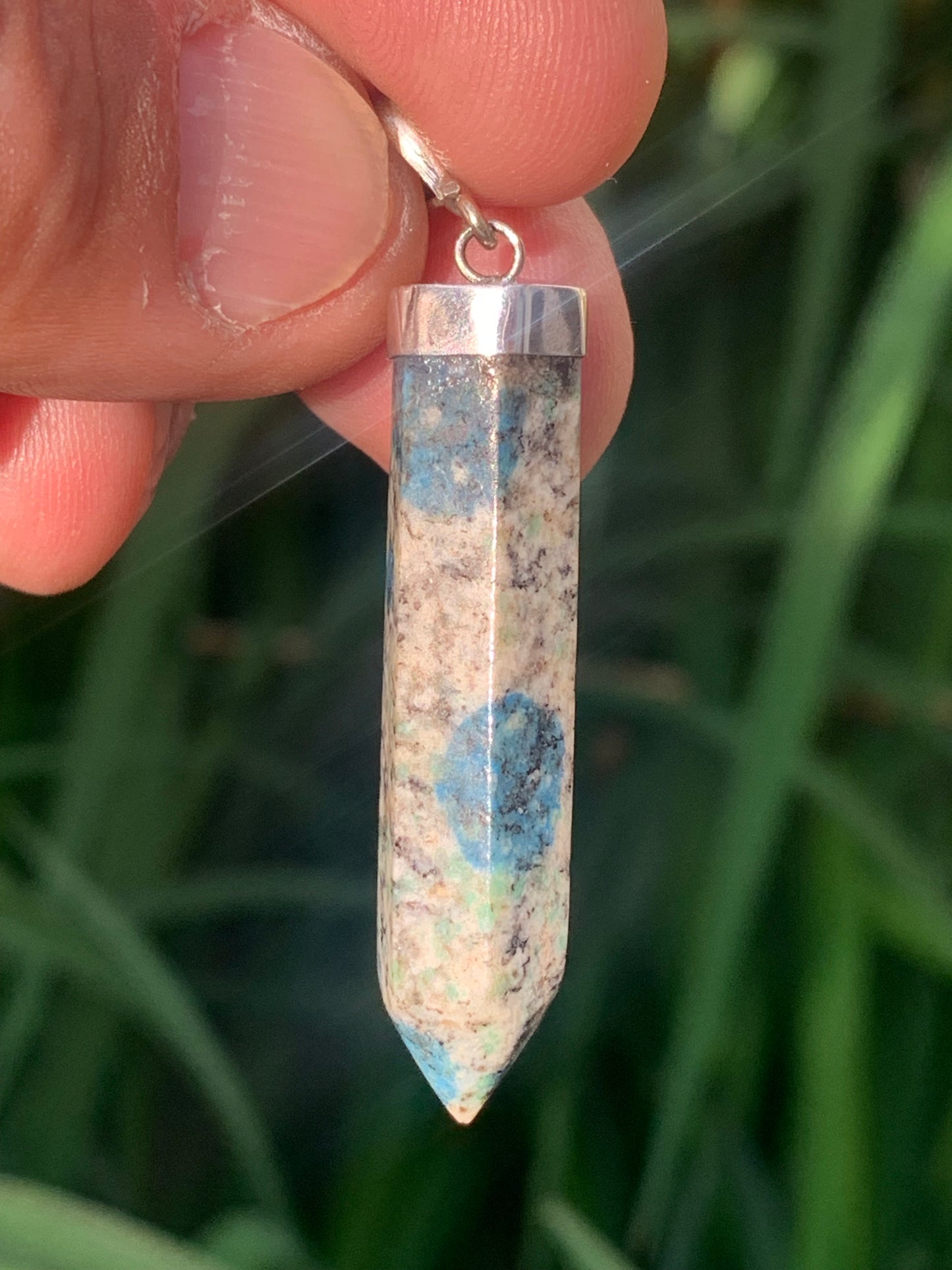 Jasper K2* (Granite with Azurite), piece in rhodium-plated 0925 Silver, 58 millimeters high x 10 millimeters wide x 10 thick. Sold with an adjustable black cord!