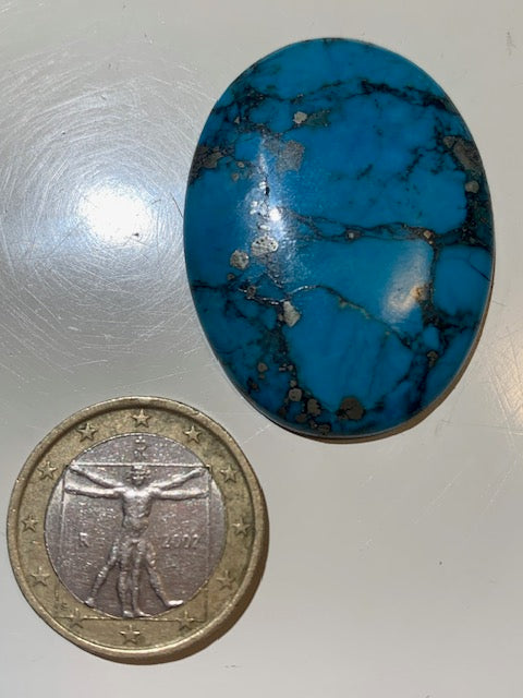 Turquoise reconstituée, cabochon de forme ovale de 40 mm x 30 x 5 - 9,4 gr.
