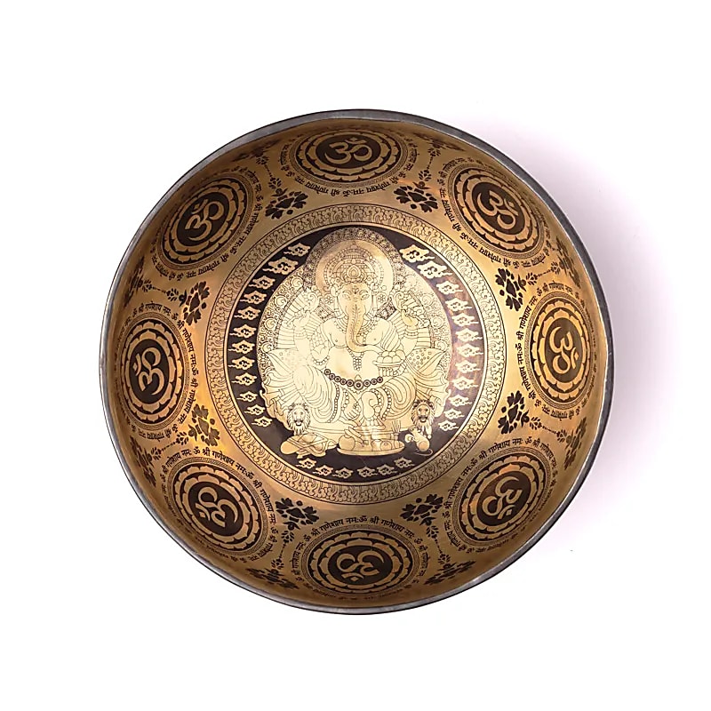 Bol en 7 métaux avec gravure de 'Ganesh', taille de 22/24 cm - ± 1400/1600 gr. Vendu avec maillet adapté. Fait main au Népal !
