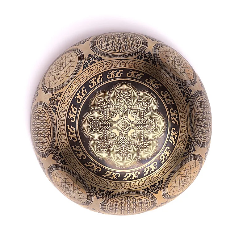 Bol en 7 métaux avec gravure de 'Ganesh', taille de 22/24 cm - ± 1400/1600 gr. Vendu avec maillet adapté. Fait main au Népal !