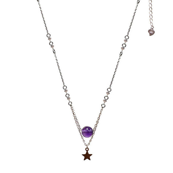 Collier en Argent 925 de 42 cm de long, accompagné d'une délicate chainette de 5 cm. Orné d'une élégante perle d'améthyste de 8 mm ainsi qu'une étoile !