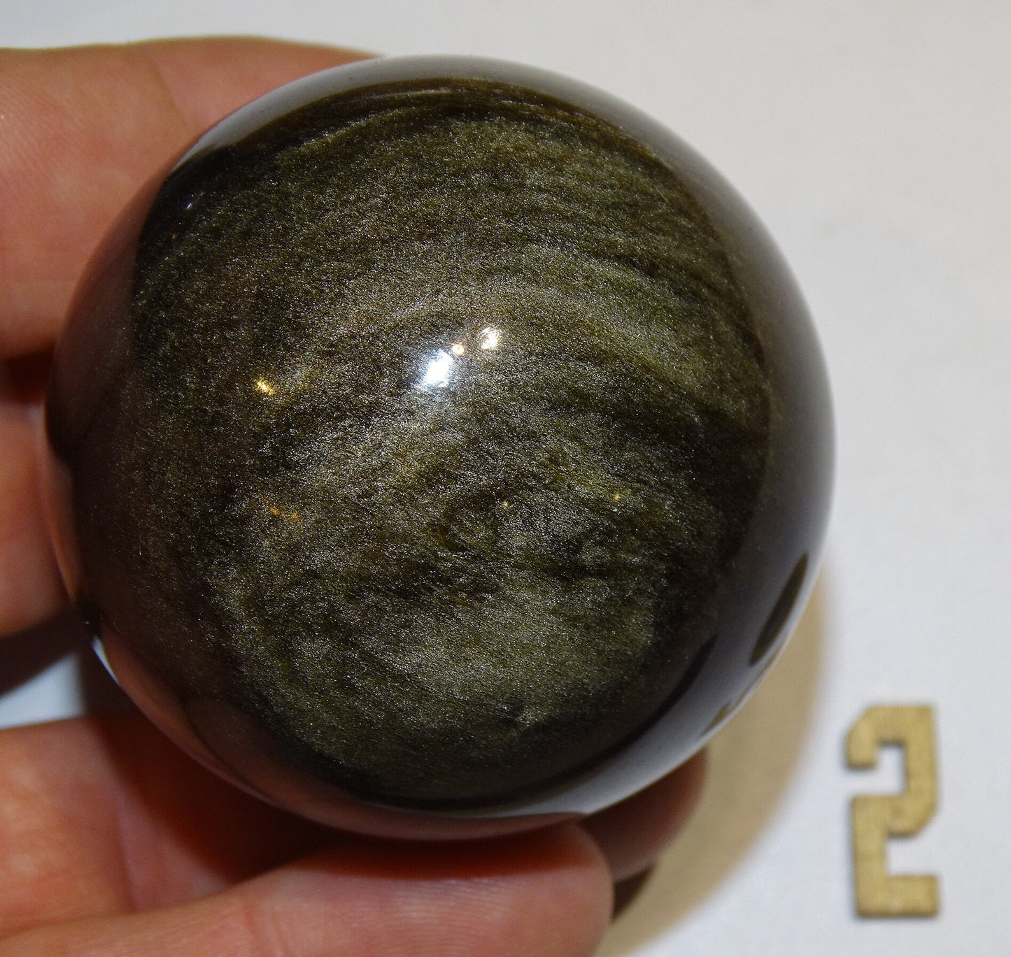 Sélection de 2 sphères en Obsidienne doré, de 53 et 56 millimètres - 130 et 160 grammes. Une pierre naturellement belle ! Parfait pour la lithothérapie, collection, exposition...!