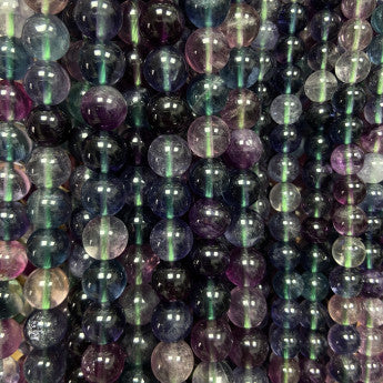 Fluorite multicolore qualité EXTRA, perles rondes 6 ou 8 mm, vendu : en fil de perle 38/39 cm, en bracelet de 17 à 21 cm, en collier de 45 ou sautoir de 60 cm. Qualité AAA !