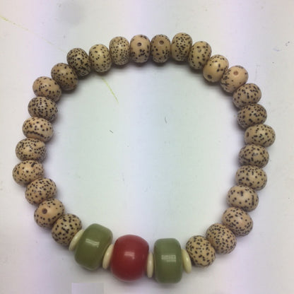 Bracelet, collection en graines ou bois, élastique avec fermeture coulissante. Belle qualité, parfait !