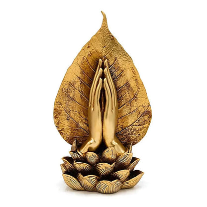 Ornement doré représentant deux mains soutenant une femme en méditation  26 x 15 x 11,5 cm