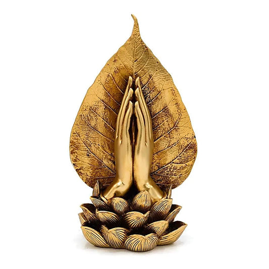 Ornement doré représentant deux mains soutenant une femme en méditation  26 x 15 x 11,5 cm