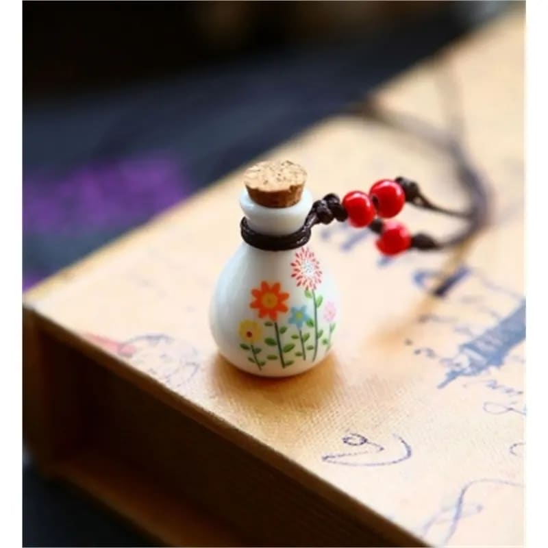 Ceramic essential oil bottle/pendant - Sold with adjustable black cord - 3.5 x 2 mm