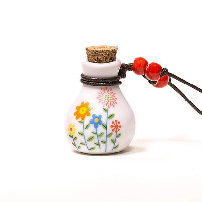 Ceramic essential oil bottle/pendant - Sold with adjustable black cord - 3.5 x 2 mm