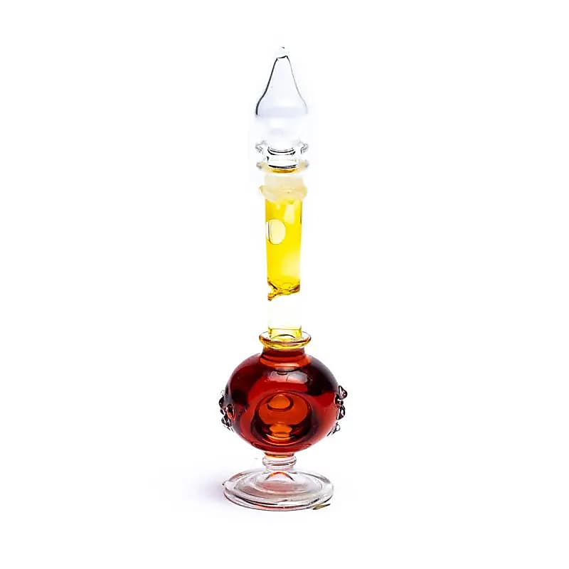 Huile de parfum 'Patchouli', fabriquée à partir d'huiles essentielles pures extraites de fleurs, de feuilles, de racines et de bois - De chez Song of India
