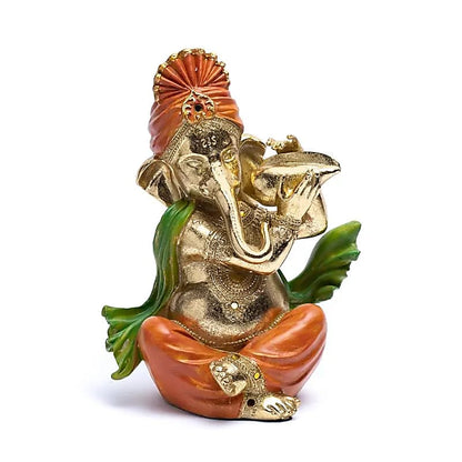 Ganesh assis jouant de la trompette - 25 x 20 x 13 cm - 1260 grammes - Modèle peint à la main !