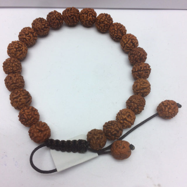 Bracelet, collection en graines ou bois, élastique avec fermeture coulissante. Belle qualité, parfait !