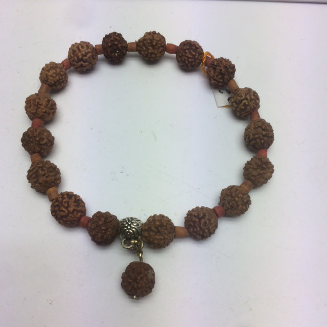 Bracelet, collection en graines ou bois, élastique avec fermeture coulissante. Belle qualité, parfait !