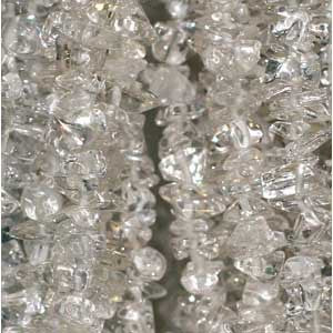 Cristal de roche/ quartz, bracelet de 17 à 21 cm ou en collier de 42 cm ou sautoir de 85 cm. Perle 'baroque/ chips' de 4/7 mm, montées sur fil élastique ou fil d'acier de haute résistance !