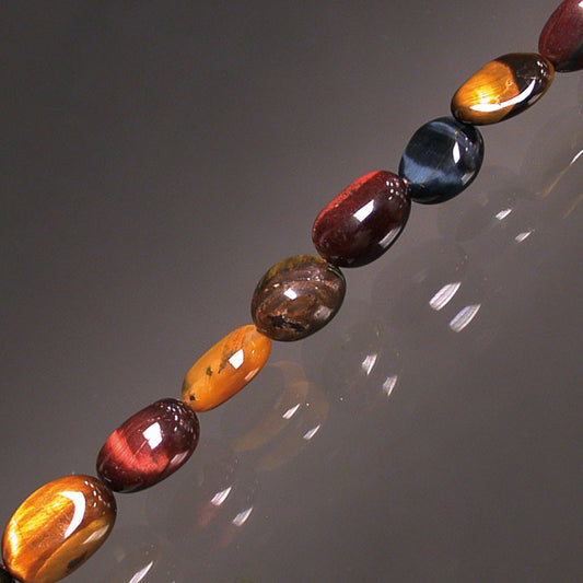 Œil de Tigre/ Œil de Taureau/ Œil de Faucon, bracelet de 17 à 21cm, collier de 42cm et sautoir de 60cm. Perles de type 'Graine' de formes naturelles montées sur fil de haute résistance !