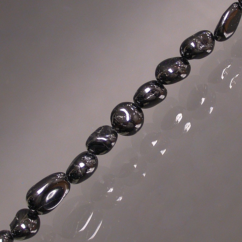 Tourmaline noire, bracelet de 17 à 21cm, collier de 42cm et sautoir de 60cm. Perles de type 'Graine' de formes naturelles montées sur fil de haute résistance !