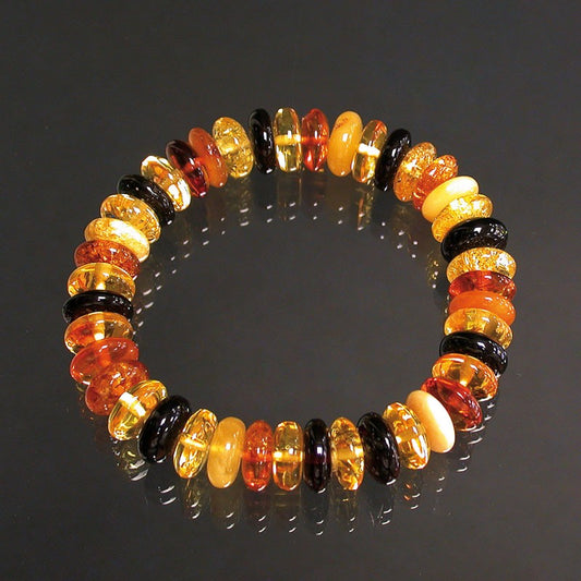 Ambre – Bracelet de perles ‘pastilles’ 9 mm (18 cm). Qualité AA à AAA, monté sur fil élastique haute résistance. Superbes perles, légères et d’une douceur incroyable !