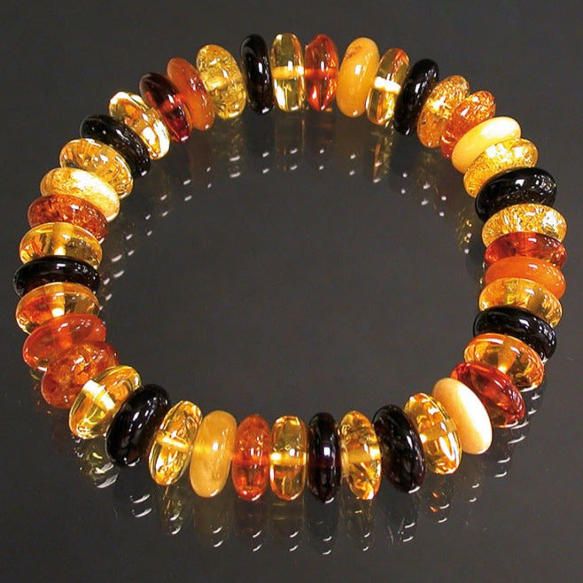 Ambre – Bracelet de perles ‘pastilles’ 9 mm (18 cm). Qualité AA à AAA, monté sur fil élastique haute résistance. Superbes perles, légères et d’une douceur incroyable !