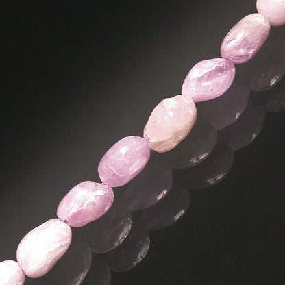 Kunzite, bracelet de 17 à 21cm, collier de 42cm et sautoir de 60cm. Perles de type 'Graine' de formes naturelles montées sur fil de haute résistance !