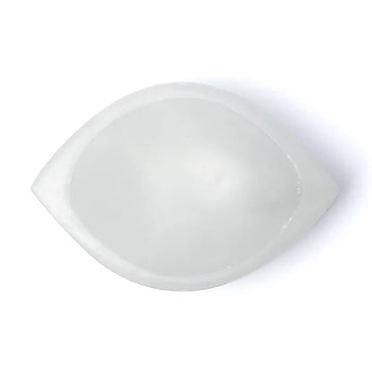 Plat en sélénite en forme d'oeil, parfait pour présenter des bijoux ou de petites décorations - 14 x 9 x 4 cm
