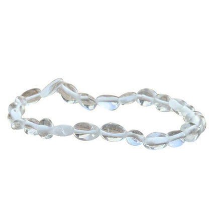 Cristal de roche (quartz), bracelet de 17 à 21cm, collier de 42cm et sautoir de 60cm. Perles de type 'Graine' de formes naturelles montées sur fil de haute résistance !