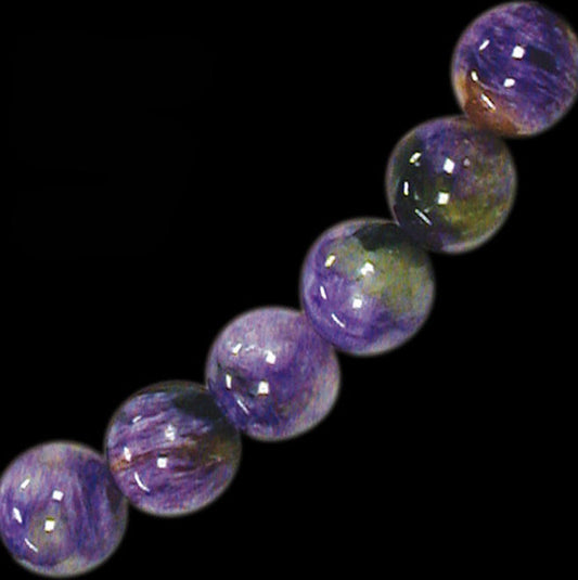 Charoïte, perles rondes de 6 ou 8 mm. Vendu en bracelet de 17 à 21 cm ou en collier de 45. Qualité AA à AAA, superbes perles !
