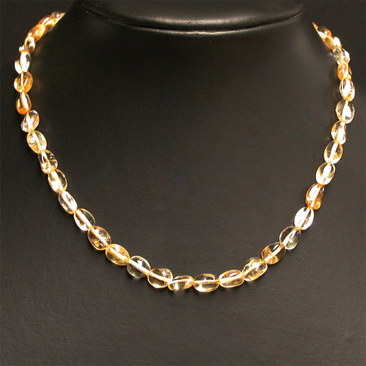 Citrine (quartz), bracelet de 17 à 21cm, collier de 42cm et sautoir de 60cm. Perles de type 'Graine' de formes naturelles montées sur fil de haute résistance !