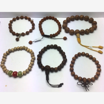 Bracelet, collection en graines ou bois, élastique avec fermeture coulissante. Belle qualité, parfait !