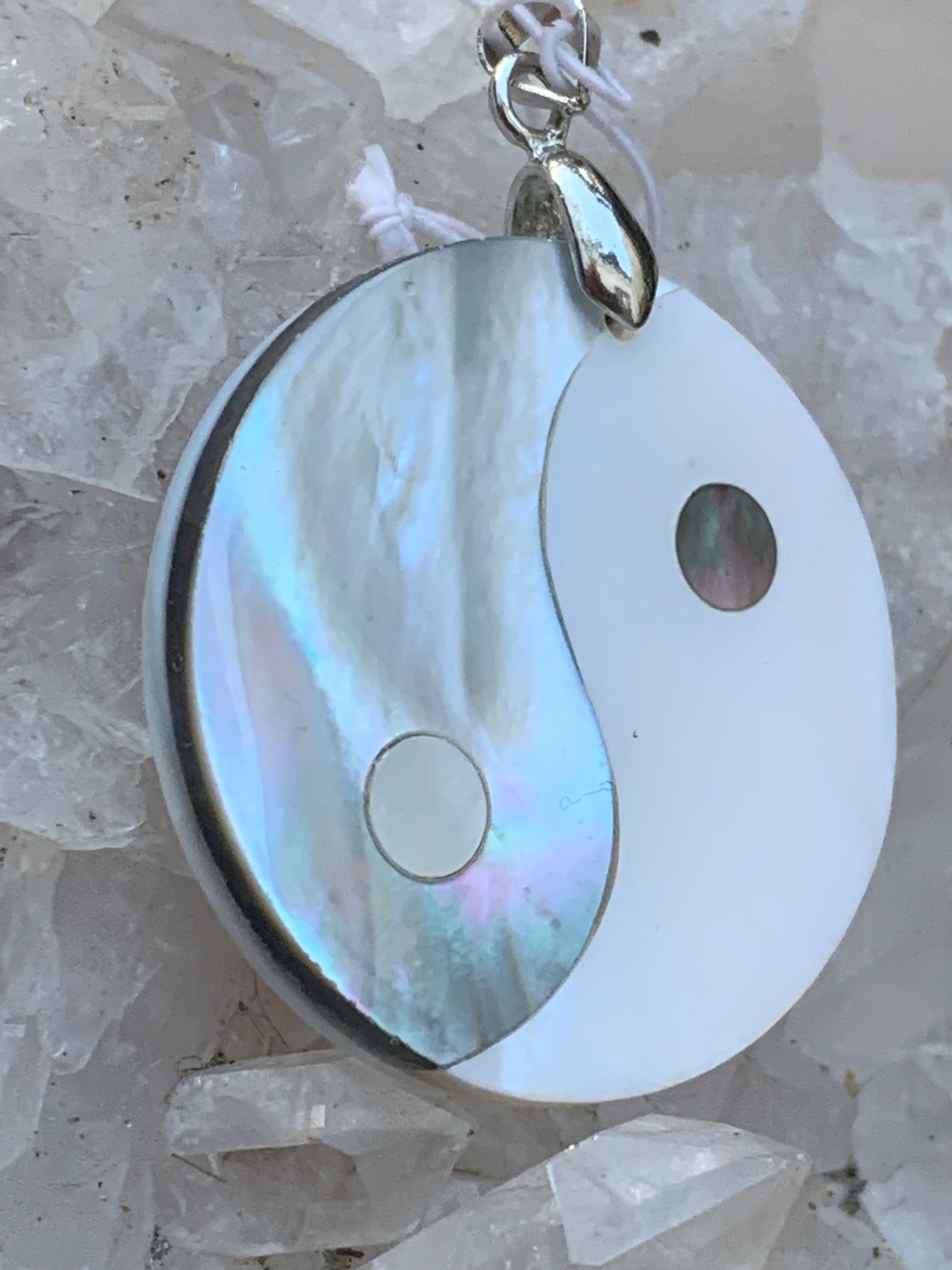 Yin-Yang, pendant in genuine mother-of-pearl shell, 3.2 centimeters in diameter, sold with an adjustable black cord with a 0.925 silver clasp. Natural elegance &amp; a symbol of balance!