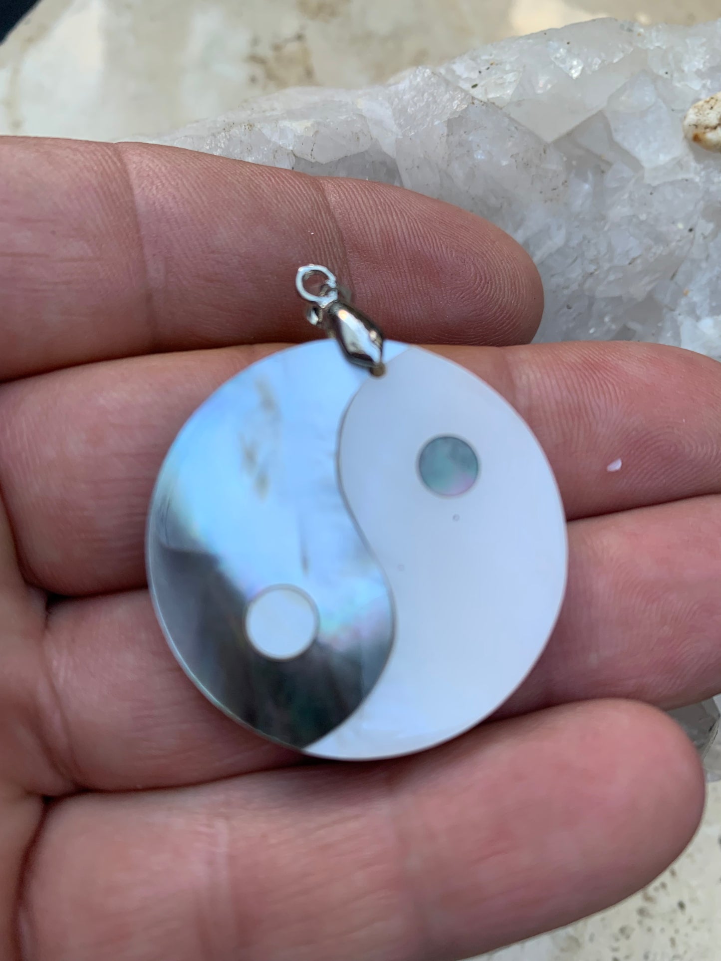 Yin-Yang, pendant in genuine mother-of-pearl shell, 3.2 centimeters in diameter, sold with an adjustable black cord with a 0.925 silver clasp. Natural elegance &amp; a symbol of balance!