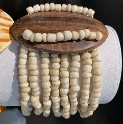 Collection de bracelets élastiques multi-rangs en nacre et bois - Vendu à l'unité