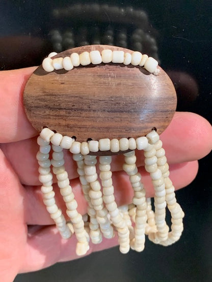 Collection de bracelets élastiques multi-rangs en nacre et bois - Vendu à l'unité