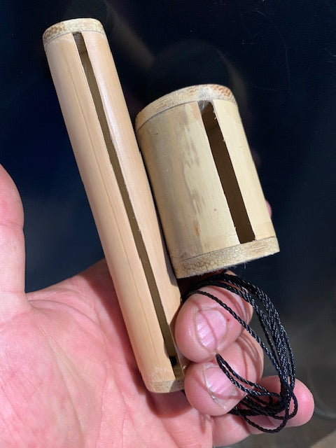 Double bamboo bullroarer/Rhombe, produces an astonishingly realistic bird chirp - 19 x 3.5 cm