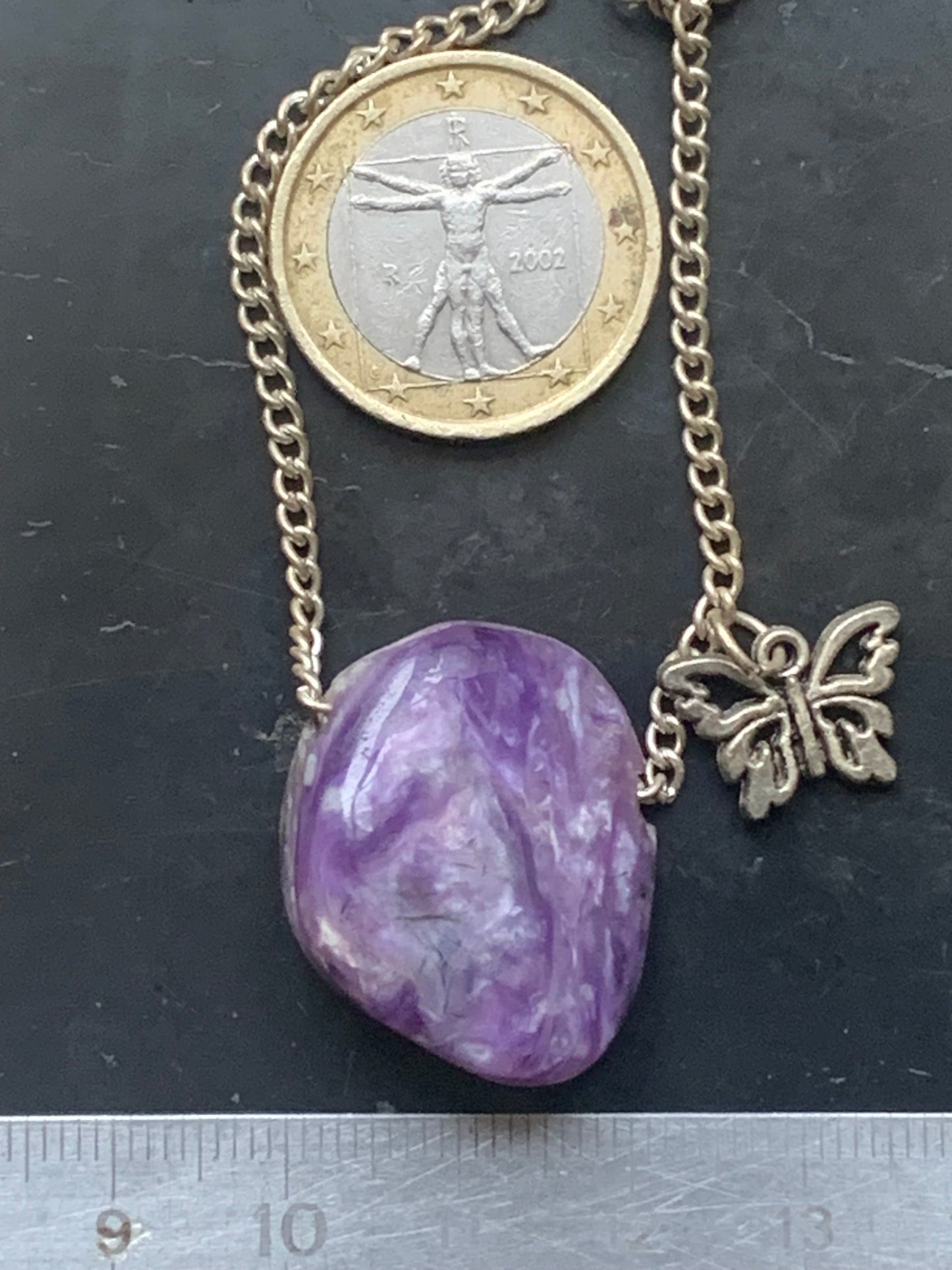 Charoïte, pendentif en Argent 925 de 27mm de hauteur x 21 de largeur x 10 d'épaisseur. Vendu avec cordon réglable de couleur noire !