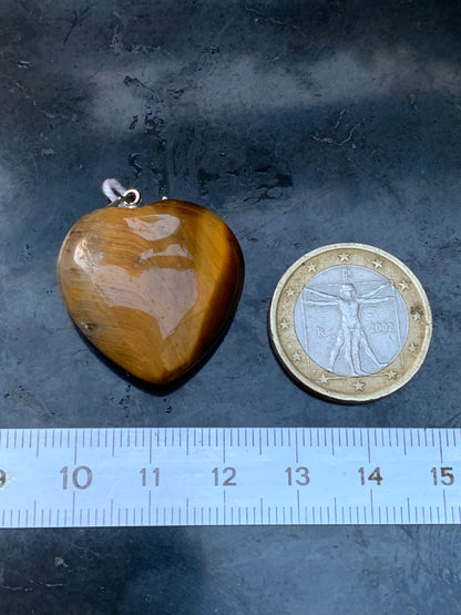 Oeil de tigre, pendentif 'Coeur' en Argent, de 32mm de hauteur x 26 de largeur x 10 d'épaisseur. Vendu avec cordon réglable de couleur noire offert !