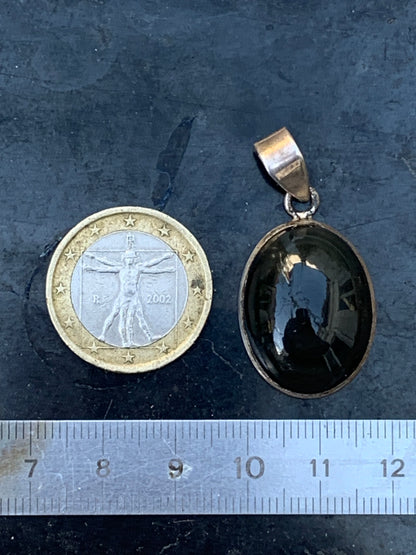 Obsidienne Oeil celeste, pendentif en Argent 925, de 37 millimètres de hauteur x 20 mm de largeur x 10 millimètres. Vendu avec cordon noir réglable offert !