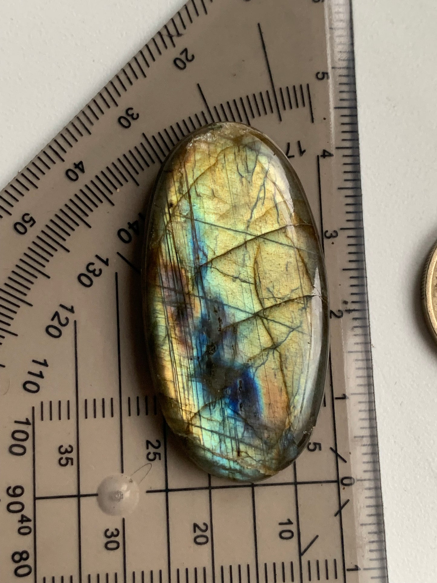 Labradorite, cabochon de forme 'ovale' - ± 42 x 22 x 6 mm - 9,6 gr. - Qualité AA à AAA !