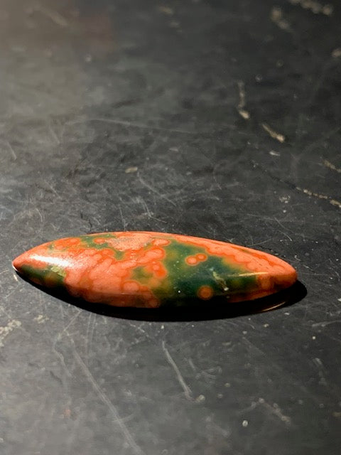 Jaspe Orbiculaire (Aussi appelé Jaspe Océan), cabochon de forme 'marquise' - ± 25 x 11 x 3 mm - 1 gr. - Qualité AAA !