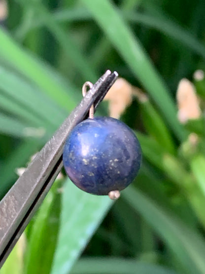 Lapis lazuli, 12 millimeter diameter pearl pendant. Sold with an adjustable black cord!