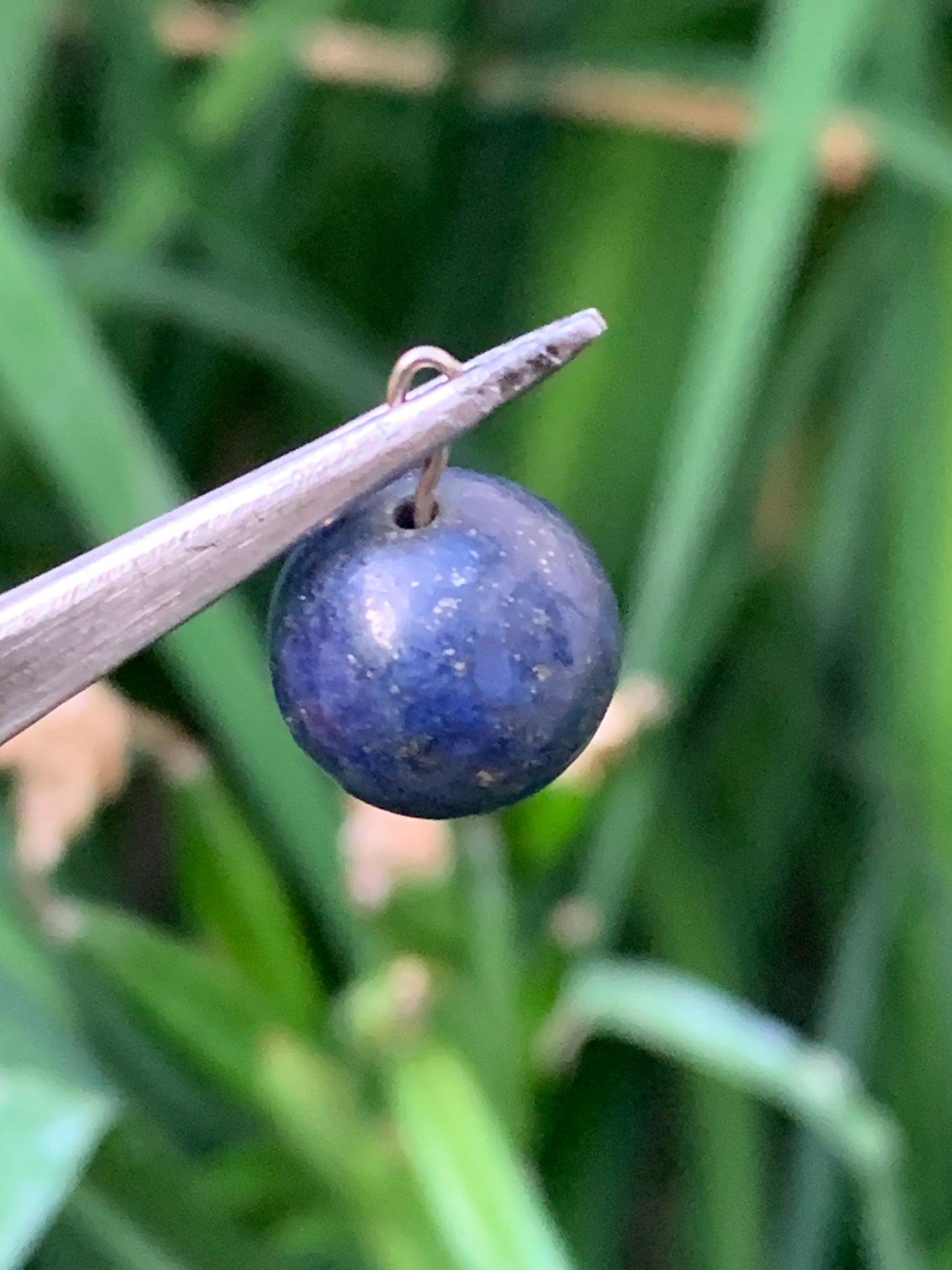 Lapis lazuli, 12 millimeter diameter pearl pendant. Sold with an adjustable black cord!